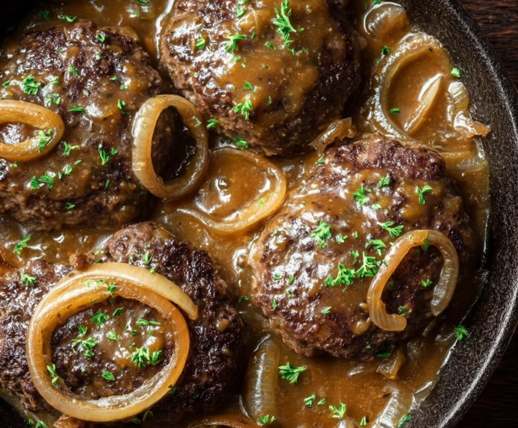 Delicious Salisbury Steak served with rich onion gravy and tender vegetables.